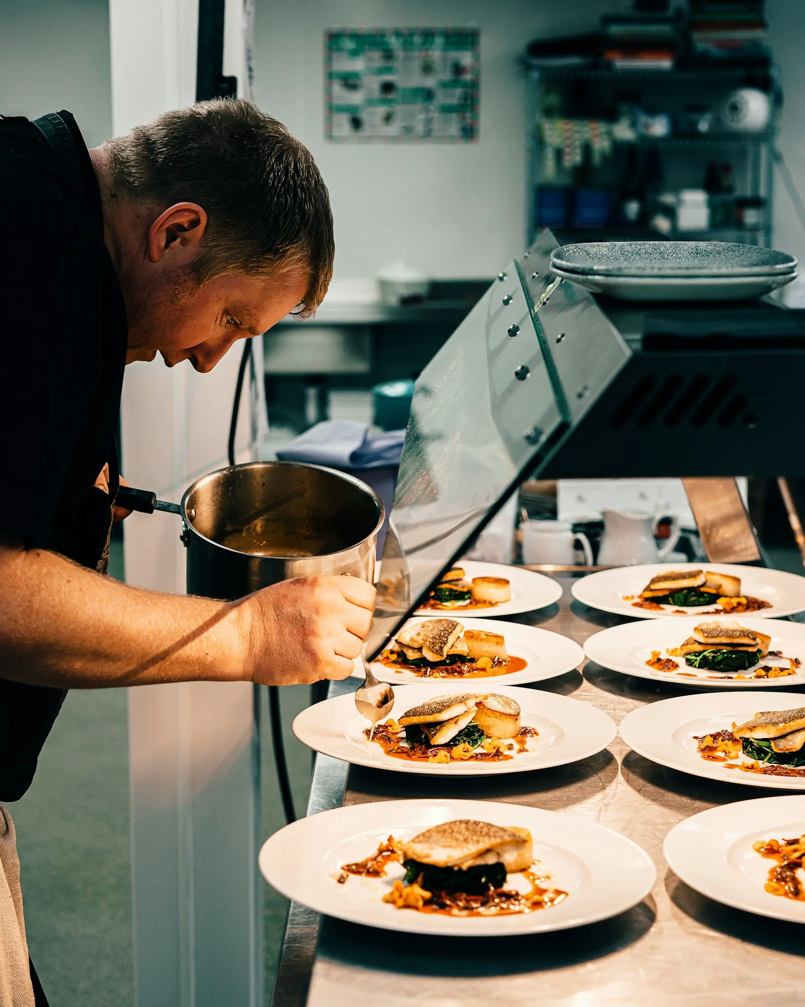 Chef working the line of a professional kitchen
